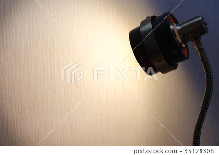 Copy space illuminated by lights Bulb color c Dark space Left space 35128308