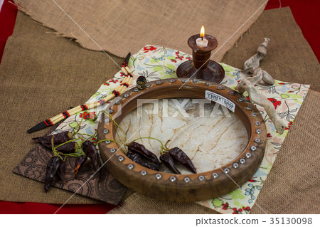 Various djembes and tambourine in front of a 35130098