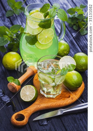 lemonade mojito in a glass on a black wooden 35131082