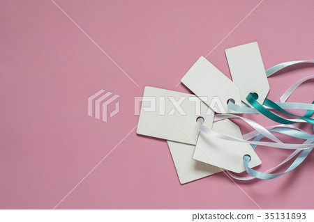 Blank paper price sale tags On pink background 35131893