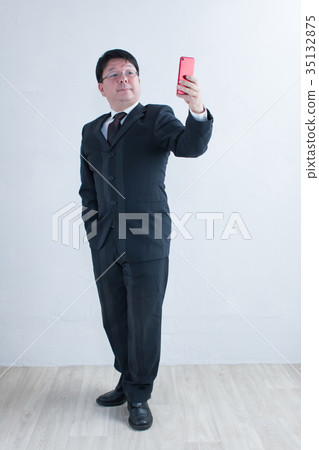 Businessman middle man 35132875