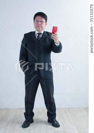 Businessman middle man 35132879