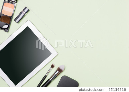 Flat lay of make up cosmetic with digital tablet Flat lay of make up cosmetic with digital tablet 35134516