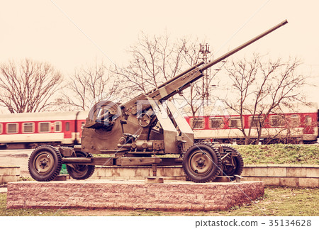 Anti-aircraft machine gun and train in motion 35134628