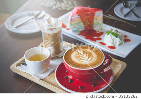 aroma coffee red cup latte art and tasty cake  35135262