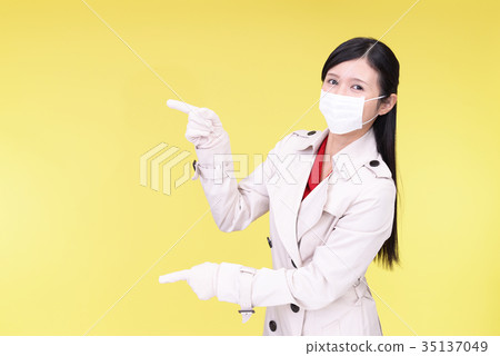 A smiling woman in a mask 35137049