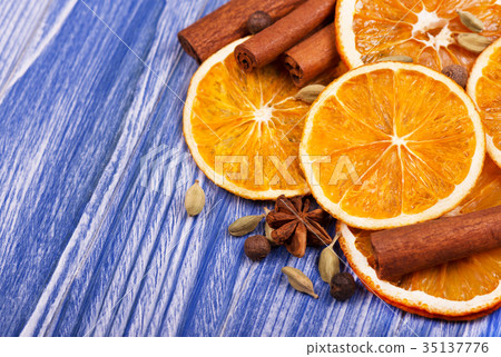 Dry slices of orange, cinnamon, allspice and Dry slices of orange, cinnamon, allspice and 35137776