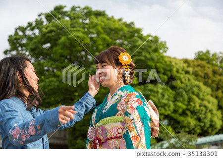 Women and friends wearing kimono Women and friends wearing kimono 35138301