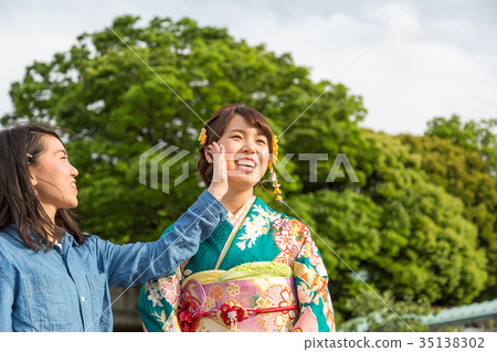Women and friends wearing kimono Women and friends wearing kimono 35138302