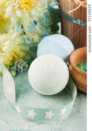 Bath bombs on blue concrete background Bath bombs on blue concrete background 35138829