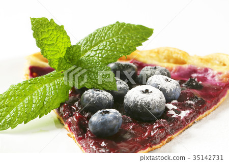 Slice of blueberry tart Slice of blueberry tart 35142731