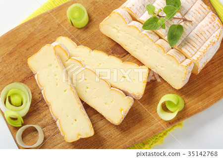Slices of Alsatian Munster cheese 35142768
