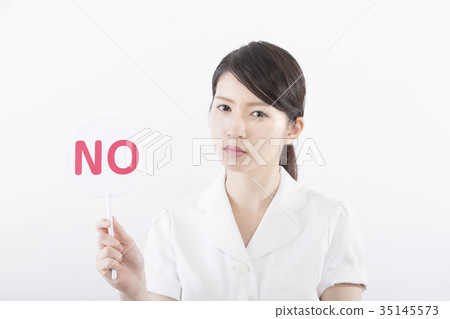 Woman in white coat giving NO 35145573
