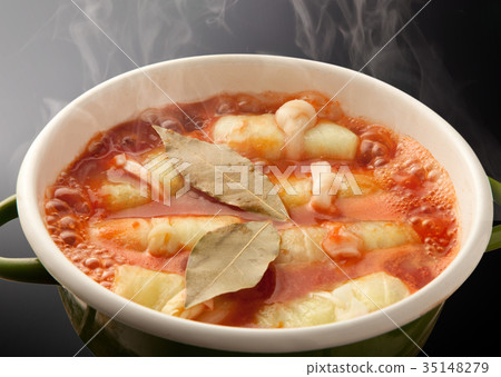 Rolled cabbage and tomato sauce Rolled cabbage and tomato sauce 35148279