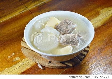 boiled radish with pork bone and egg tofu soup boiled radish with pork bone and egg tofu soup 35153774