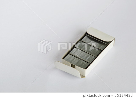 stapler wire in paper box on white background stapler wire in paper box on white background 35154453