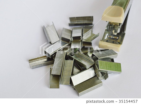 stapler and refill wire on white background stapler and refill wire on white background 35154457
