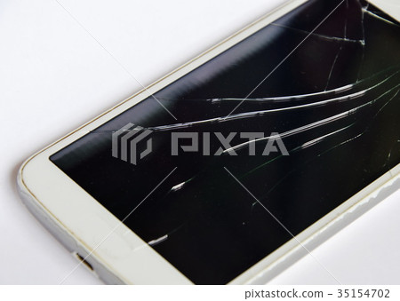 broken touch screen of white mobile phone broken touch screen of white mobile phone 35154702