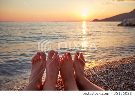 Couple lying on the beach 35155028