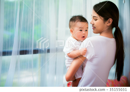 Mother and baby play togather 35155031