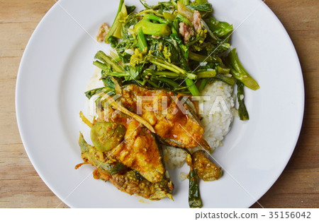 spicy curry fish and stir fried flower cabbage 35156042