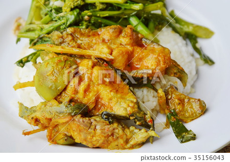 spicy curry fish and stir fried flower cabbage 35156043