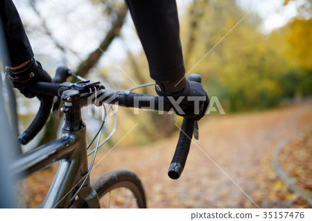 Photo of human driving bicycle 35157476