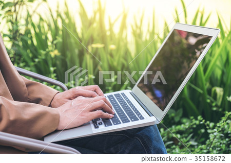 Work and relax, Woman freelancer is working on computer laptop, 35158672