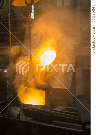 Molten iron molten metal poured in to ladle 35159843