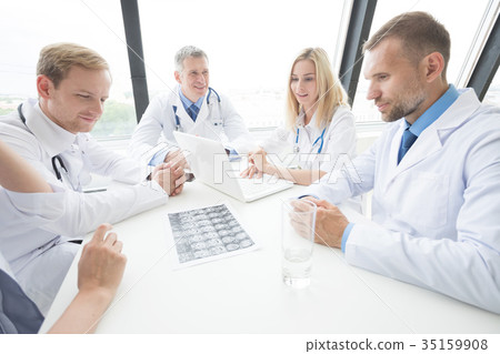 Group of medics with x-ray scan Group of medics with x-ray scan 35159908