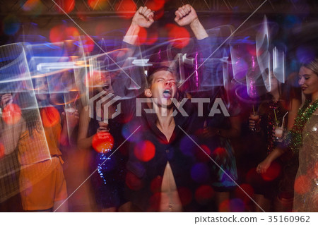 Active happy male on dance floor in motion 35160962