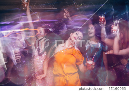 Dance party in night club in blurred motion 35160963