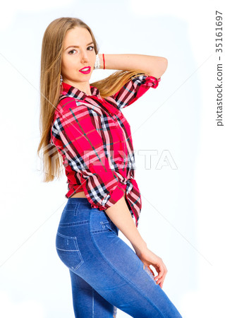 Young sexy woman dressed in jeans and checkered 35161697