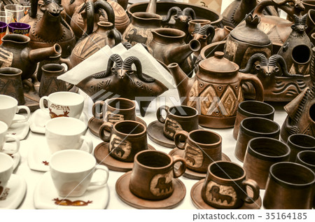 Clay coffee cups, candlesticks, teapots Clay coffee cups, candlesticks, teapots 35164185