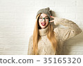 Trendy Hipster Girl in Winter Clothes Going Crazy 35165320