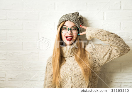 Trendy Hipster Girl in Winter Clothes Going Crazy 35165320