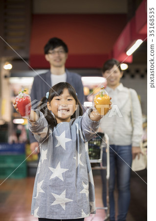 Parents and children shopping at the supermarket 35168535