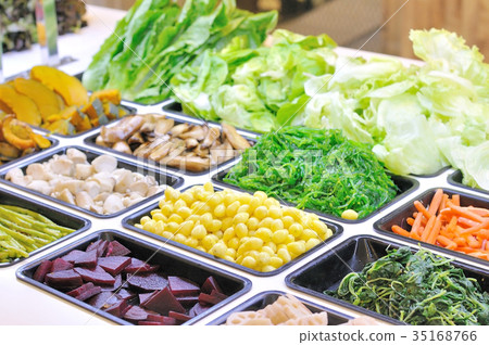 Various vegetables mixed on salad bar. 35168766
