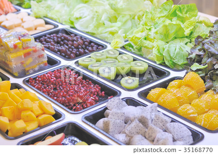 Various vegetables mixed on salad bar. Various vegetables mixed on salad bar. 35168770