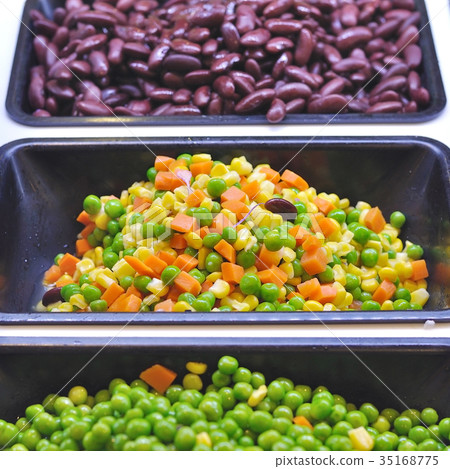 Various vegetables mixed on salad bar. Various vegetables mixed on salad bar. 35168775