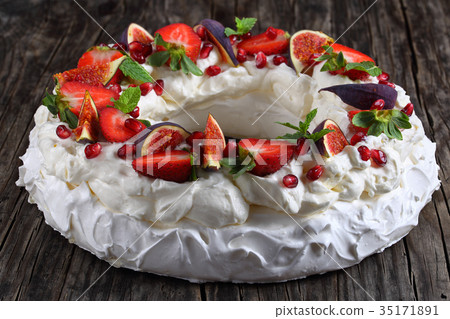 pavlova cake wreath on table, close-up pavlova cake wreath on table, close-up 35171891