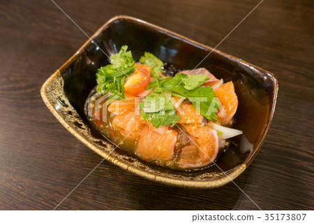 Delicious portion of fresh salmon fillet. Delicious portion of fresh salmon fillet. 35173807
