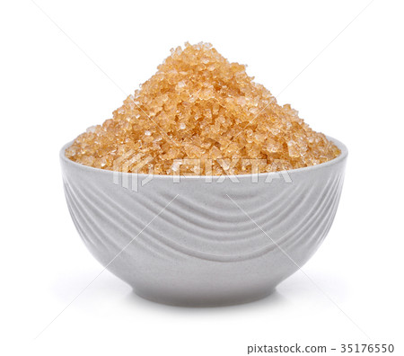 brown cane sugar in the white bowl isolated brown cane sugar in the white bowl isolated 35176550