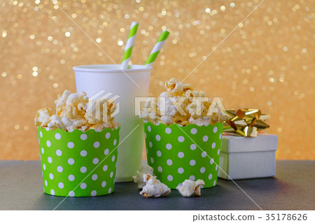 popcorn and drink in paper cup for movie and 35178626