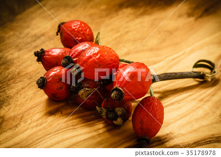 Hawthorn on wooden table background Hawthorn on wooden table background 35178978