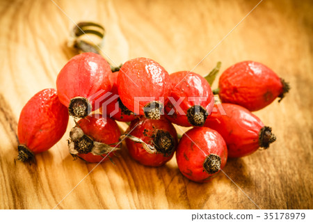Hawthorn on wooden table background Hawthorn on wooden table background 35178979