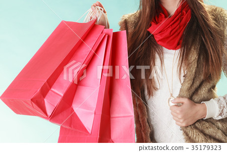 Closeup of customer bags shopping. Winter fashion. Closeup of customer bags shopping. Winter fashion. 35179323