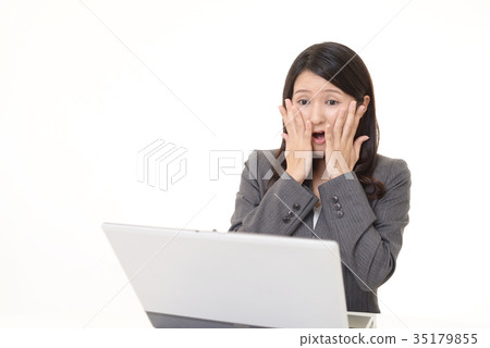 Business woman with a stunning expression 35179855