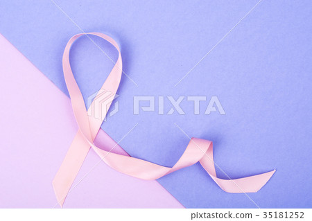 Pink ribbon on bright background-a symbol of 35181252