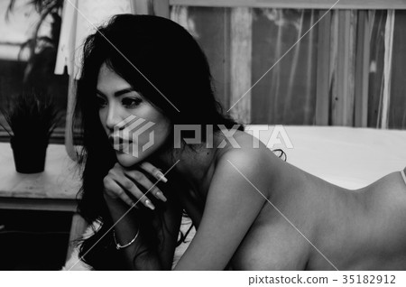 Portrait of young woman brunette with beautiful nude topless bre Portrait of young woman brunette with beautiful nude topless bre 35182912